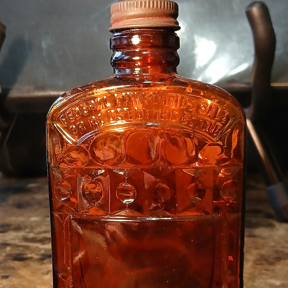 Vintage 1930s Amber Half Pint with original cap Pat D460